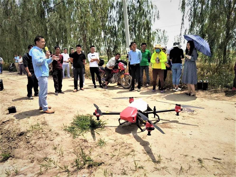 Cheng promoted XAG P Series Plant Protection UAS to local villagers