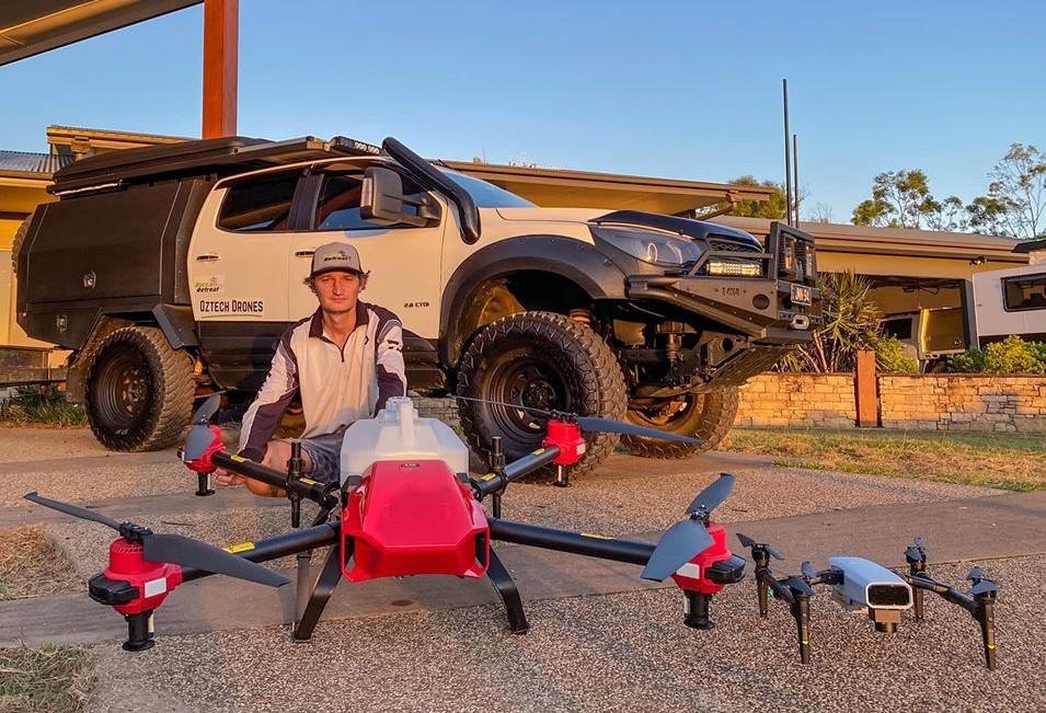Australian drone pilot Jamin Fleming with his XAG agricultural drones   