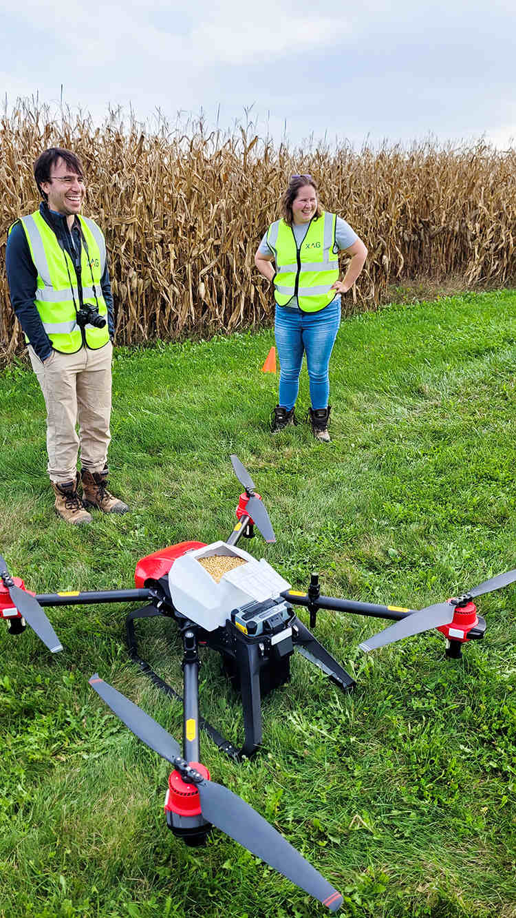 Equipped with a tank that filled with cover crop seeds, the drone was ready to take off for mission. (source: SKY AG Canada)