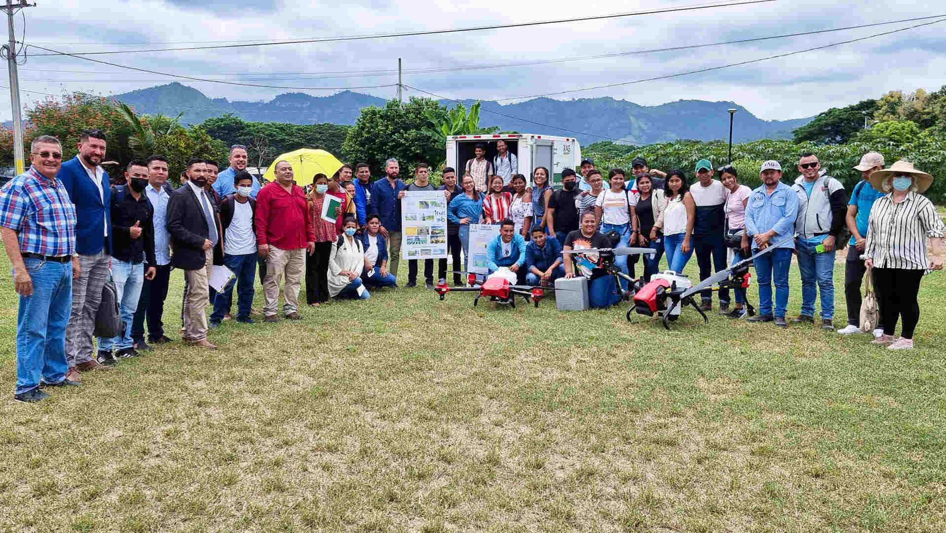 A group photo of the students and XAG drones