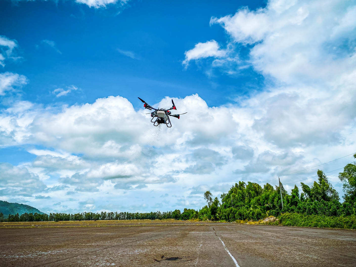  XAG P100 Agricultural Drone was sowing seeds in Nhan's rice farm