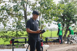 Tran Minh Man was working by the rice fields